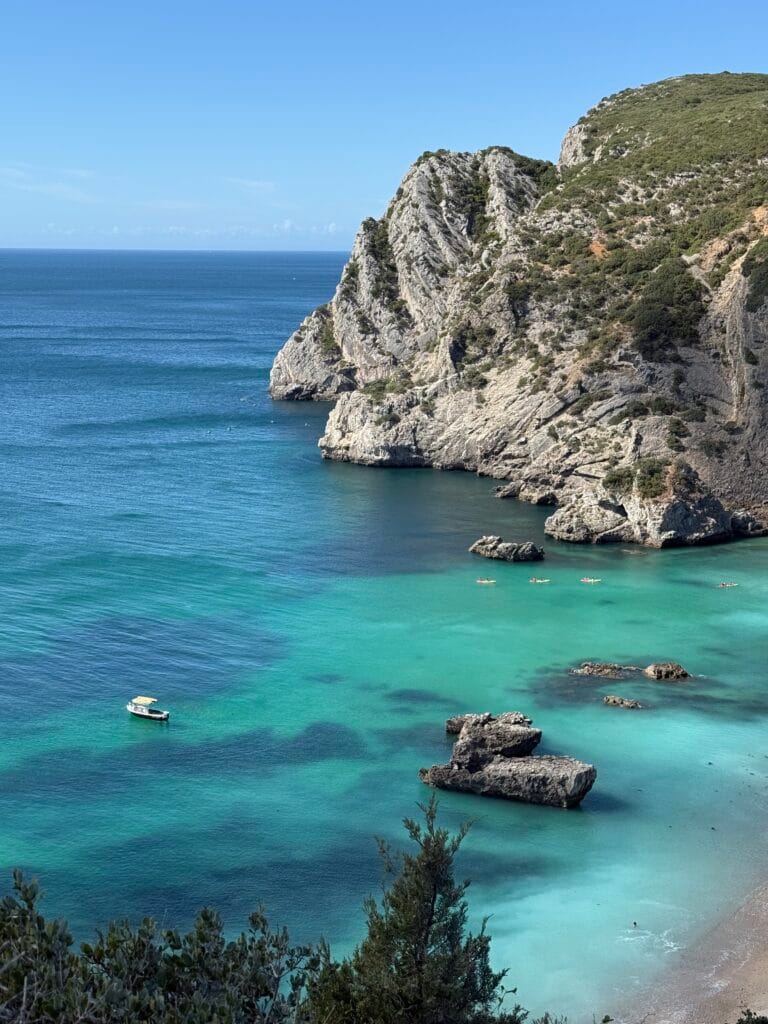 Kayaking in Arrabida: Best Kayak Tour in Sesimbra (2026 Guide) 16 kayaking in Arrábida Sesimbra Portugal turquoise water cliffs