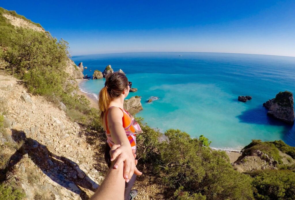 Ribeiro do Cavalo best beaches Sesimbra cliff kayak turquoise water]