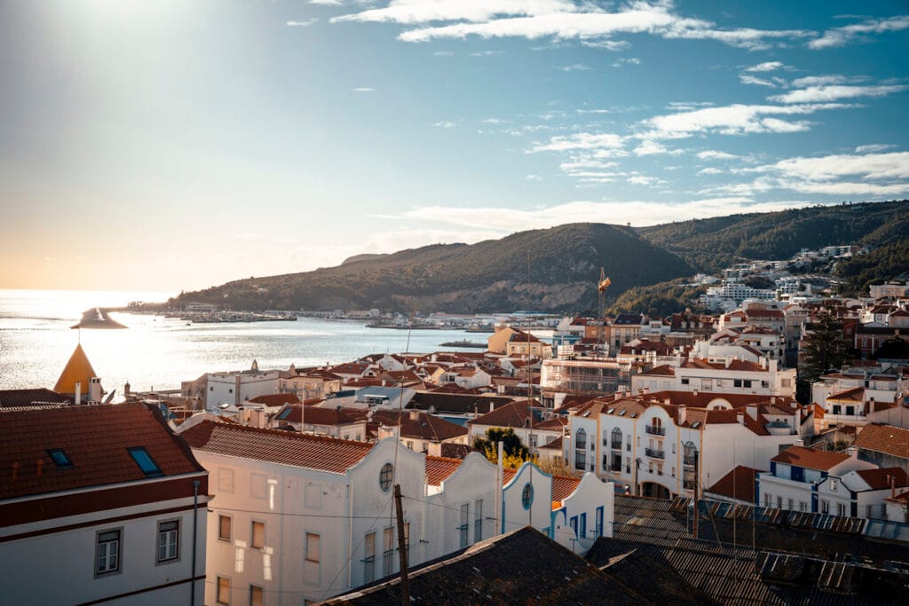 Praia de Sesimbra village beach Moorish castle Portugal afternoon
